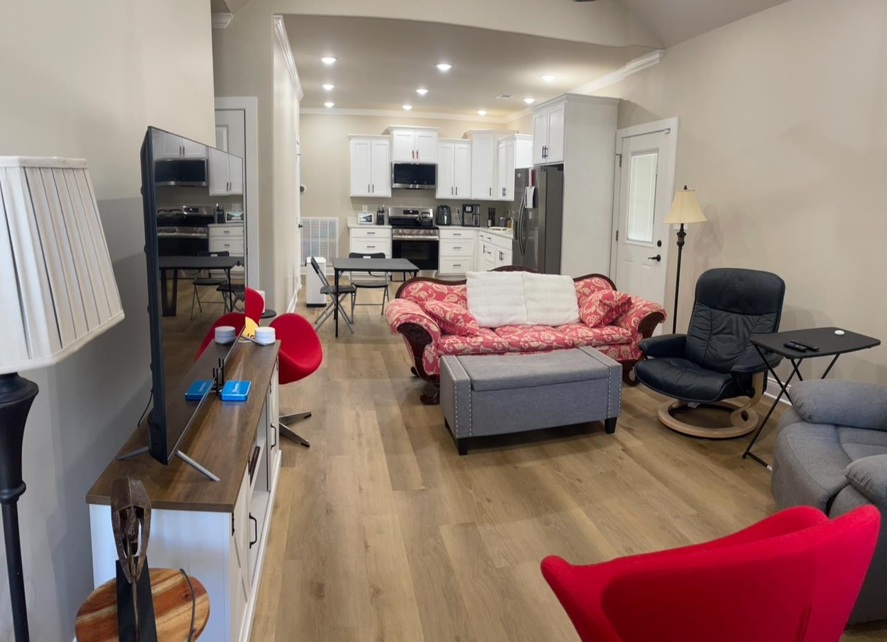 210 Church Street Ripley, TN 38063 - Photo 4 of 21 Living area with recessed lighting, crown molding, and light wood finished floors
