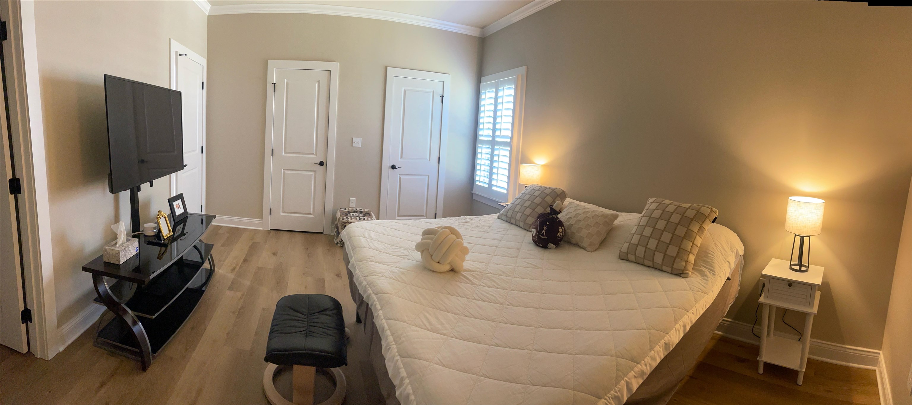 210 Church Street Ripley, TN 38063 - Photo 9 of 21 Bedroom featuring a closet, light wood-style flooring, and ornamental molding