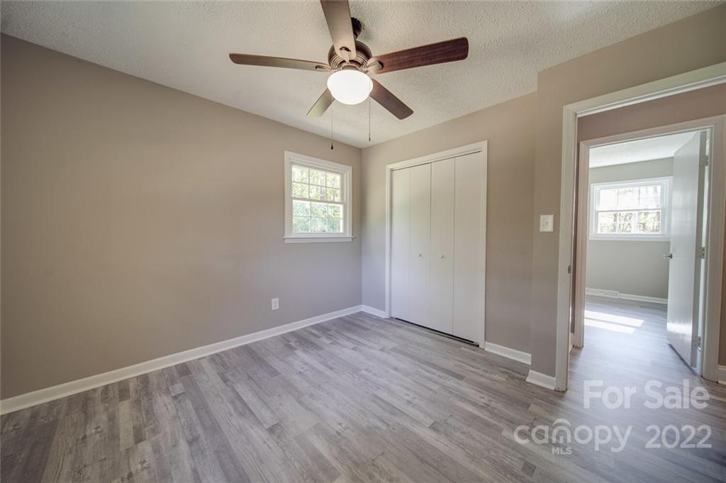 1149 Long Pine Church Road Peachland, NC 28133 - Photo 18 of 27 wooden floor in an empty room with a window
