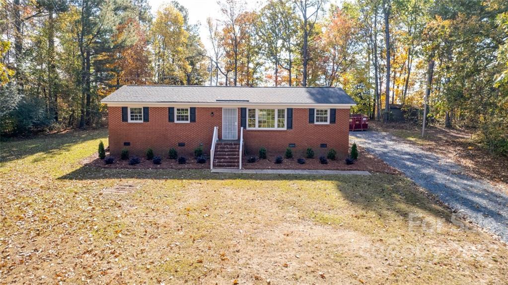 1149 Long Pine Church Road Peachland, NC 28133 - Photo 2 of 27 a view of a house with swimming pool and sitting area