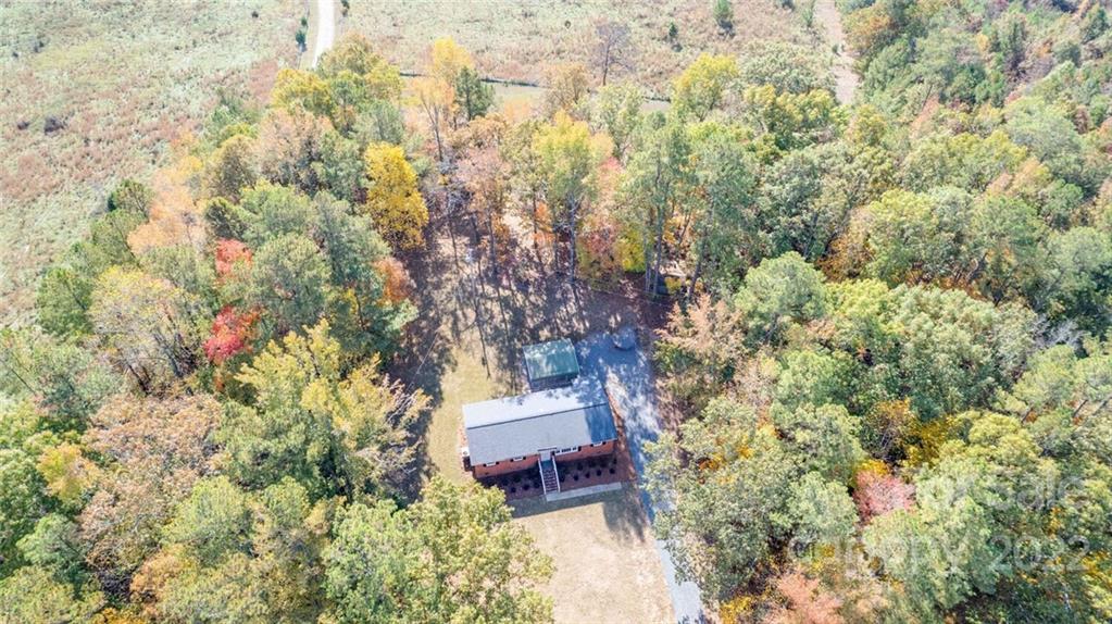 1149 Long Pine Church Road Peachland, NC 28133 - Photo 23 of 27 a view of a house with a tree