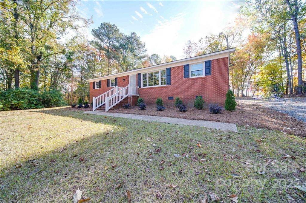 1149 Long Pine Church Road Peachland, NC 28133 - Photo 3 of 27 a view of a house with a yard
