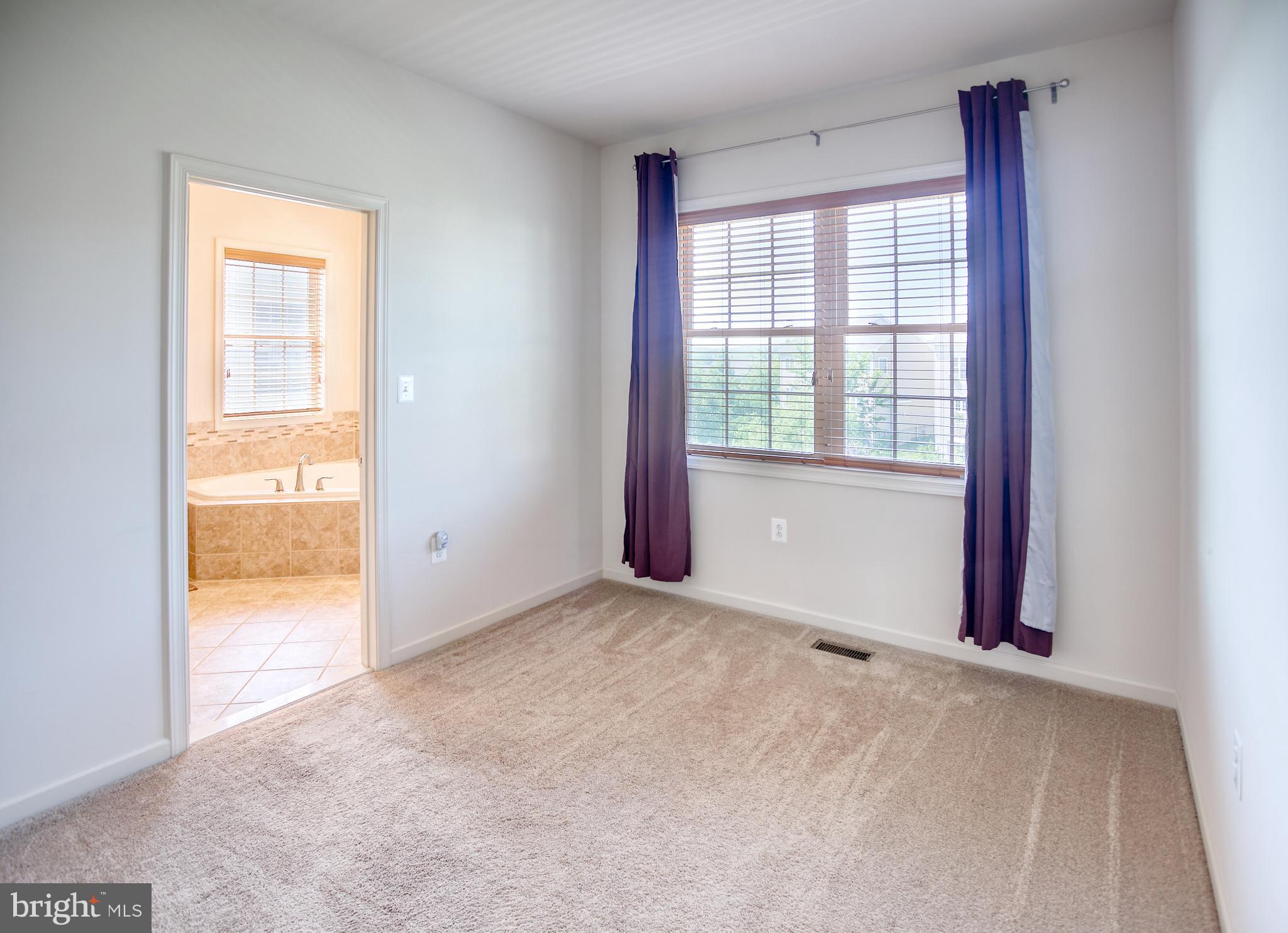 13336 Redspire Drive Silver Spring, MD 20906 - Photo 24 of 66 an empty room that has a window