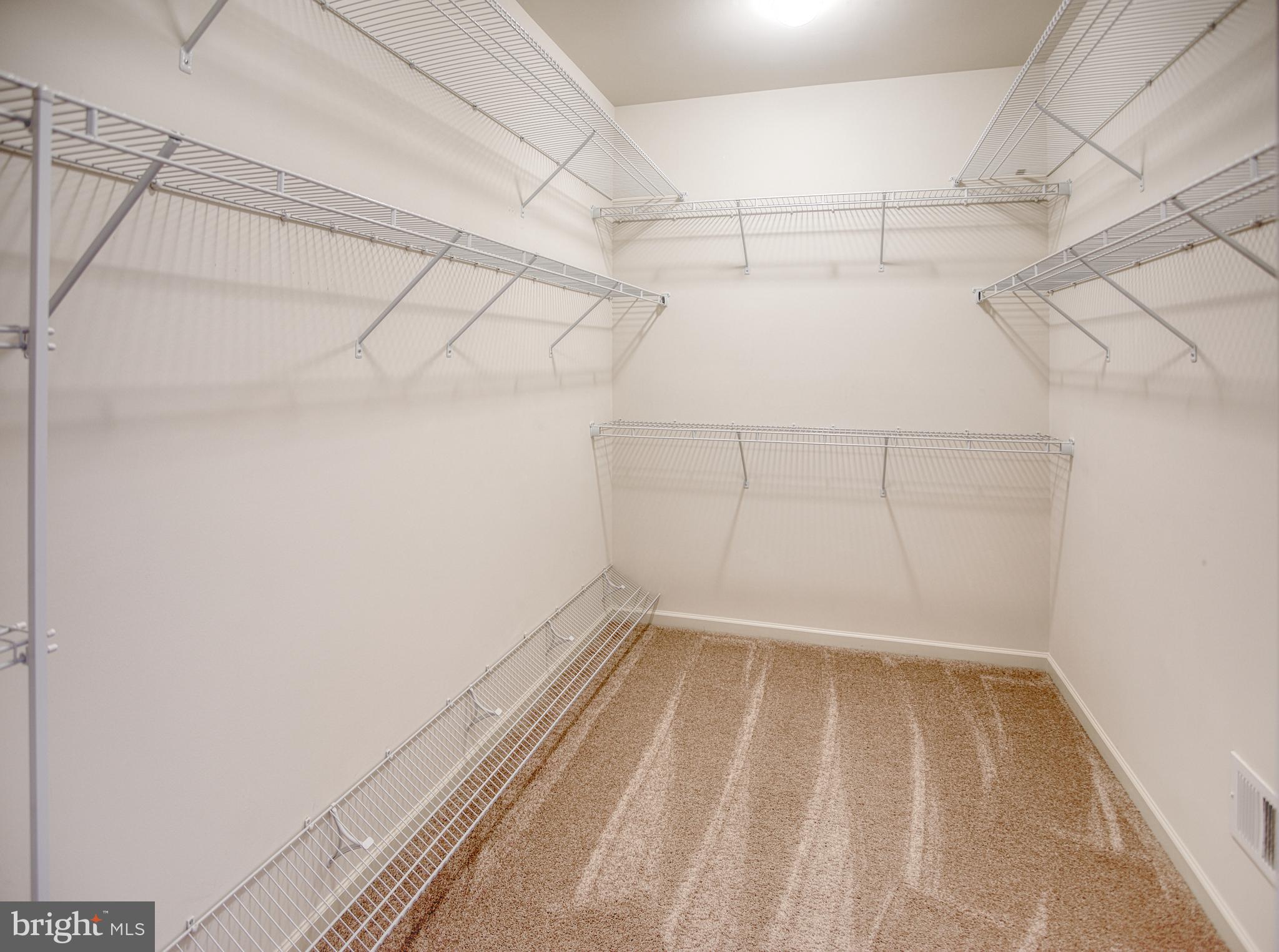 13336 Redspire Drive Silver Spring, MD 20906 - Photo 25 of 66 a view of a room with racks on the wall