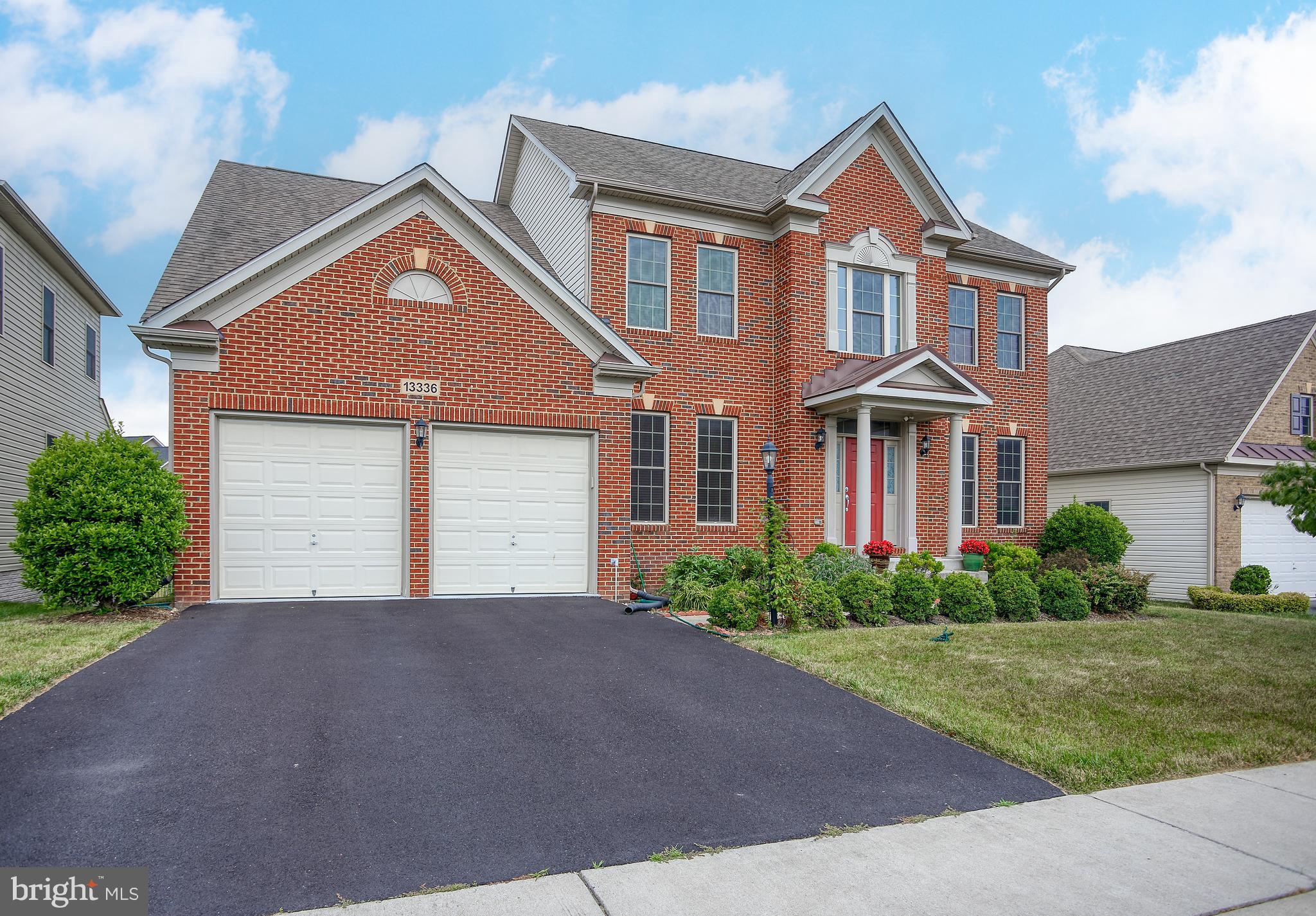 13336 Redspire Drive Silver Spring, MD 20906 - Photo 3 of 66 front view of a house with a yard