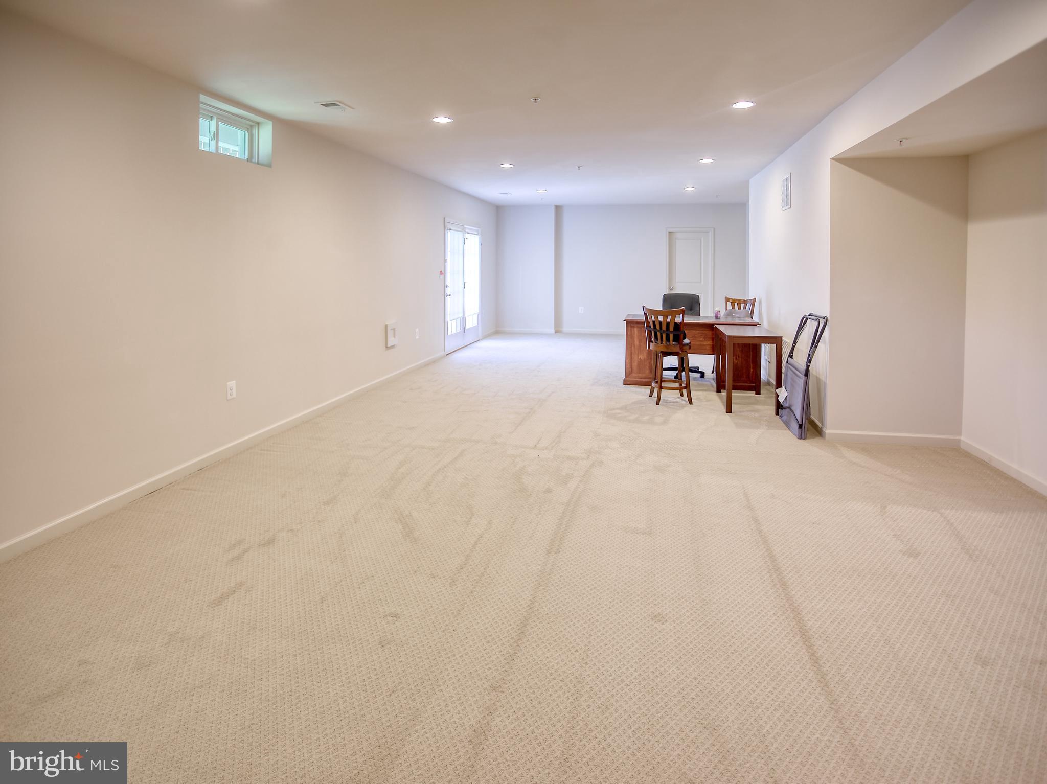 13336 Redspire Drive Silver Spring, MD 20906 - Photo 40 of 66 a view of dining room with furniture and a chandelier