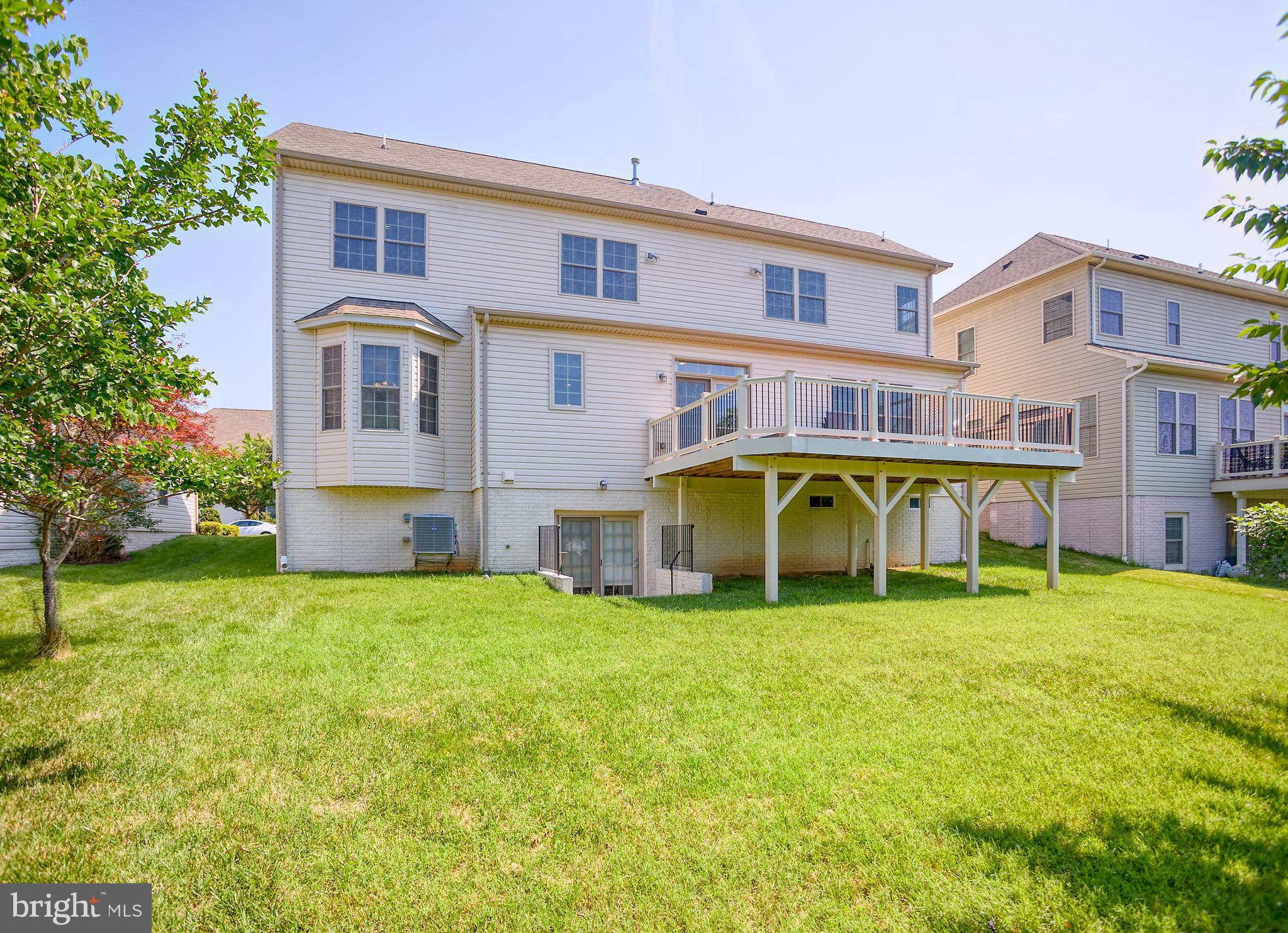 13336 Redspire Drive Silver Spring, MD 20906 - Photo 49 of 66 a view of a house with pool and chairs
