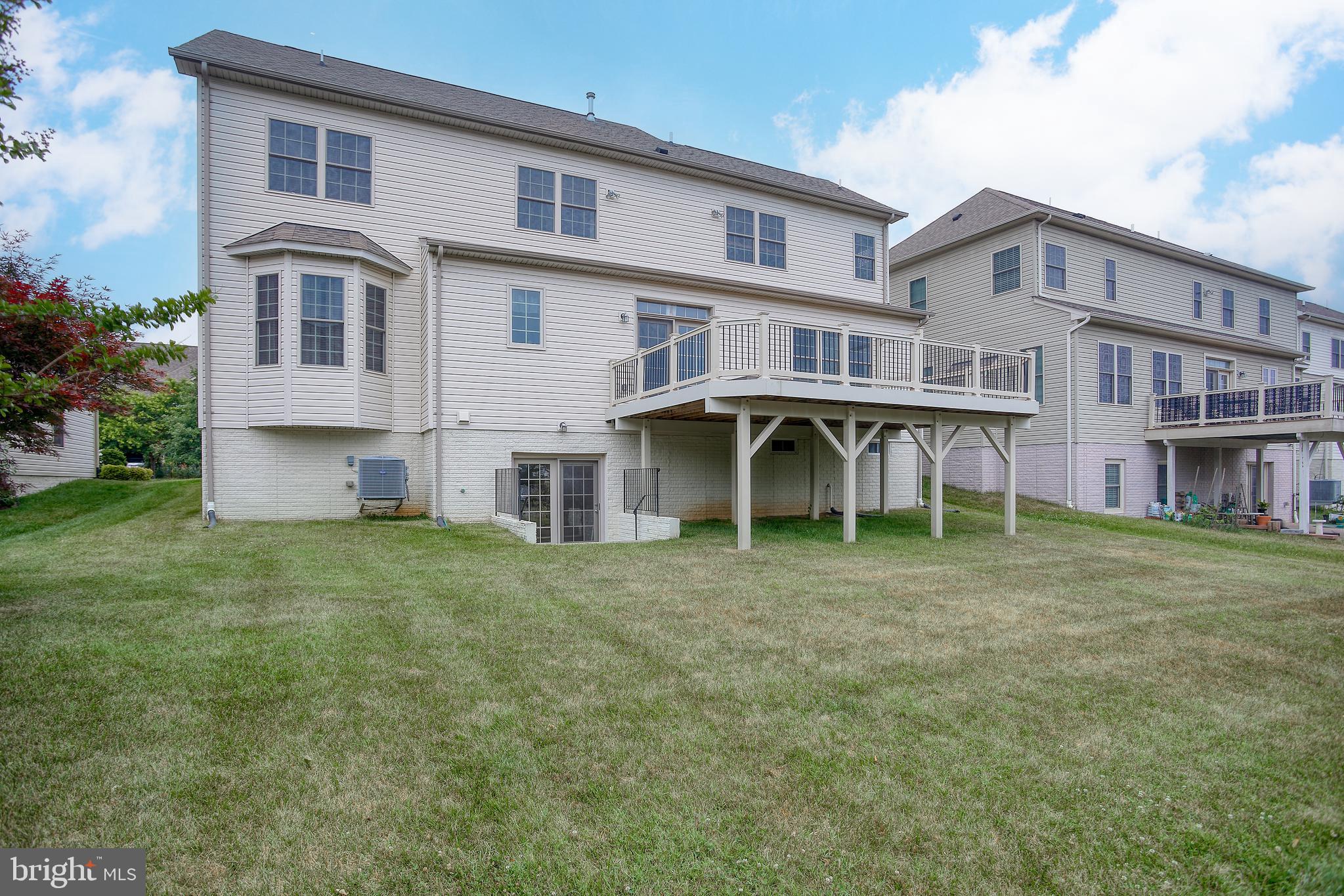 13336 Redspire Drive Silver Spring, MD 20906 - Photo 50 of 66 a view of a big house with a yard and plants