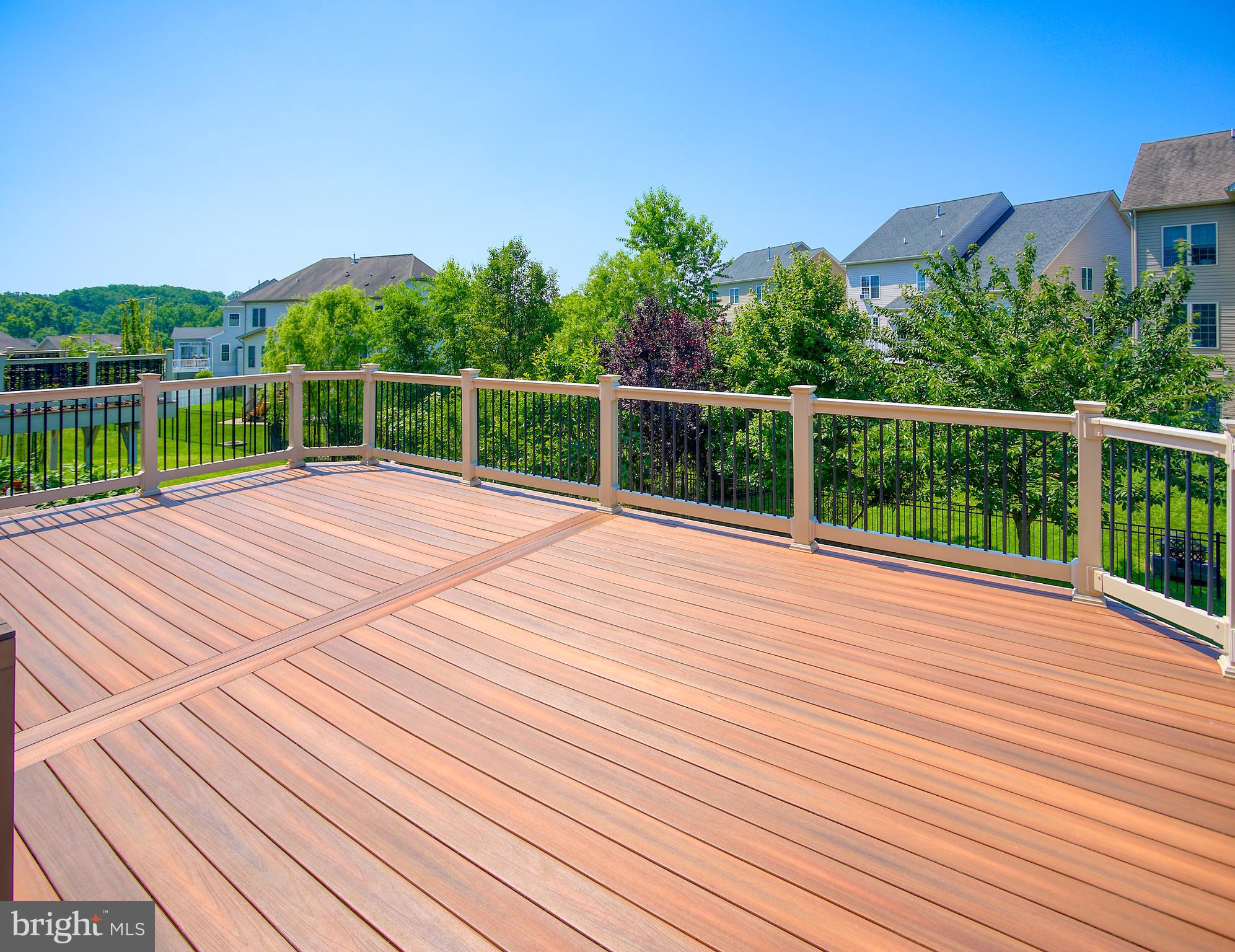 13336 Redspire Drive Silver Spring, MD 20906 - Photo 53 of 66 a view of a balcony with wooden floor and fence