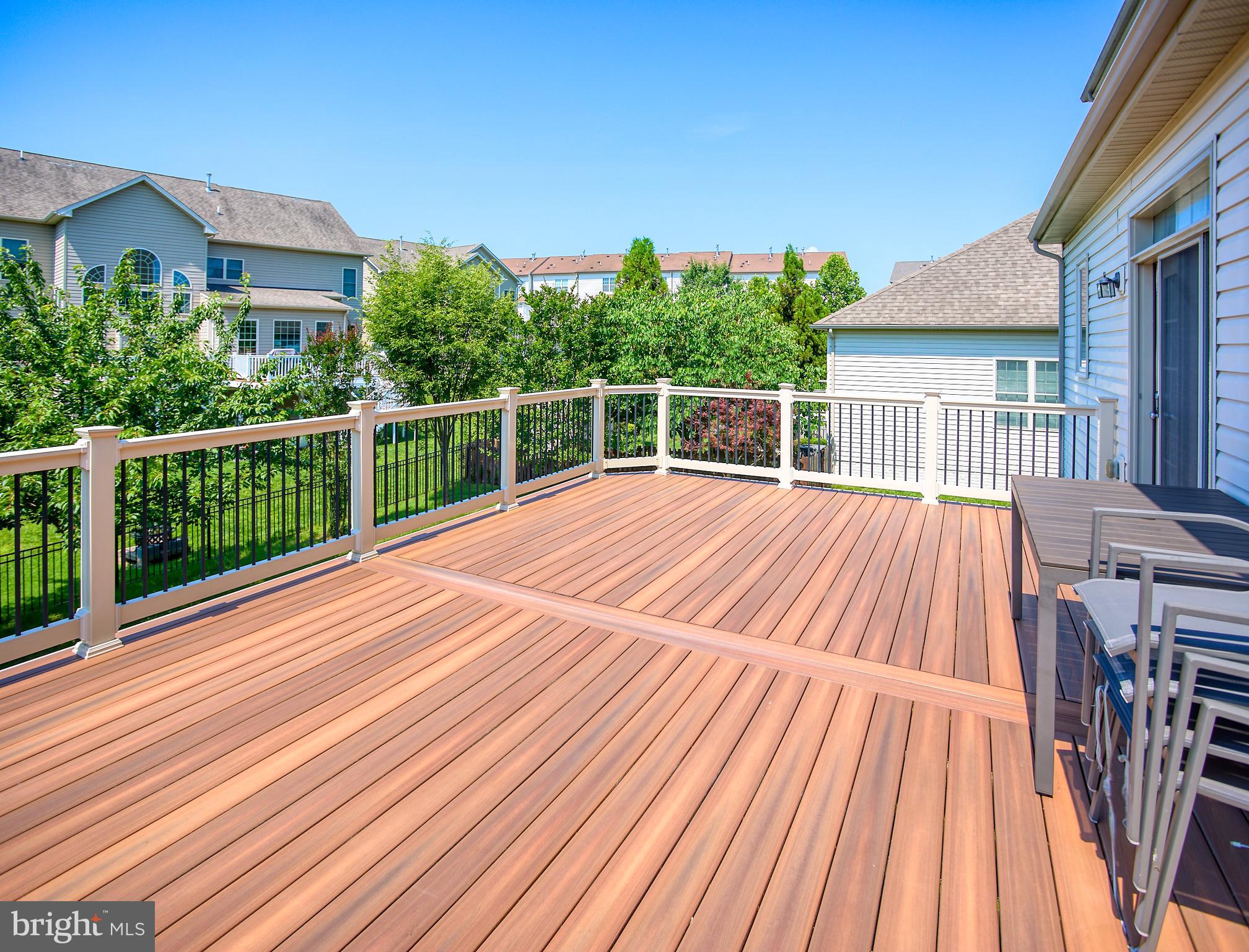 13336 Redspire Drive Silver Spring, MD 20906 - Photo 54 of 66 a view of backyard with a deck and wooden floor