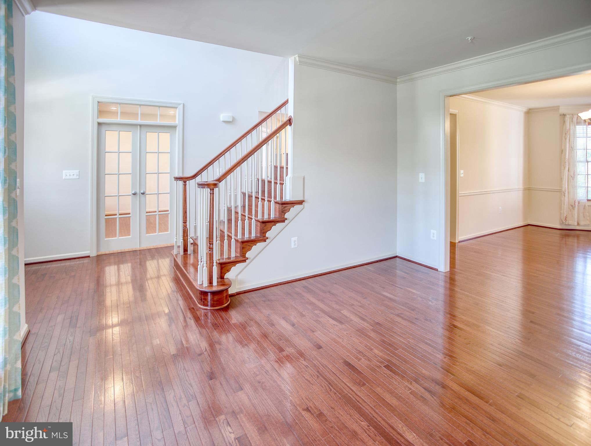 13336 Redspire Drive Silver Spring, MD 20906 - Photo 7 of 66 a view of an entryway with wooden floor