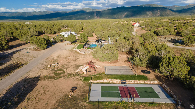 11550 Pigeon Hollow Road Spring City, UT 84662 - Photo 38 of 85 Property featuring an outdoor pickleball court, volleyball court, and a swimming pool