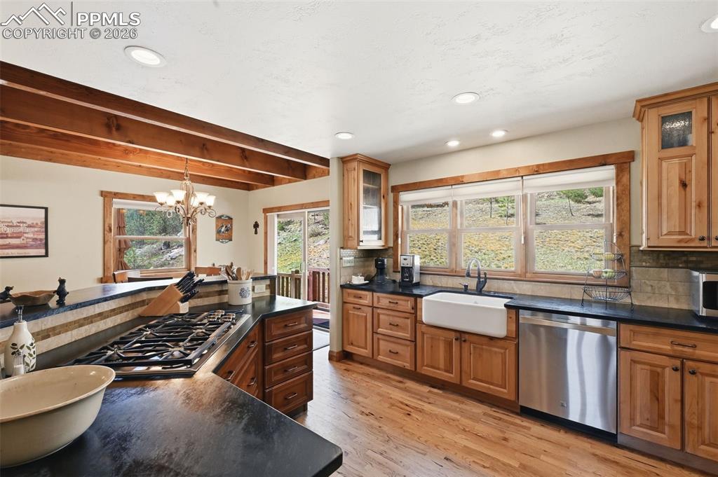 89 Ranch View Road Florissant, CO 80816 - Photo 18 of 50 This spacious kitchen provides abundant storage and countertop space, while maintaining an elegant style and great functionality.