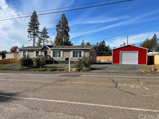 6039 Sawmill Road Paradise, CA 95969 - Photo 1 of 1 a front view of a house with a yard