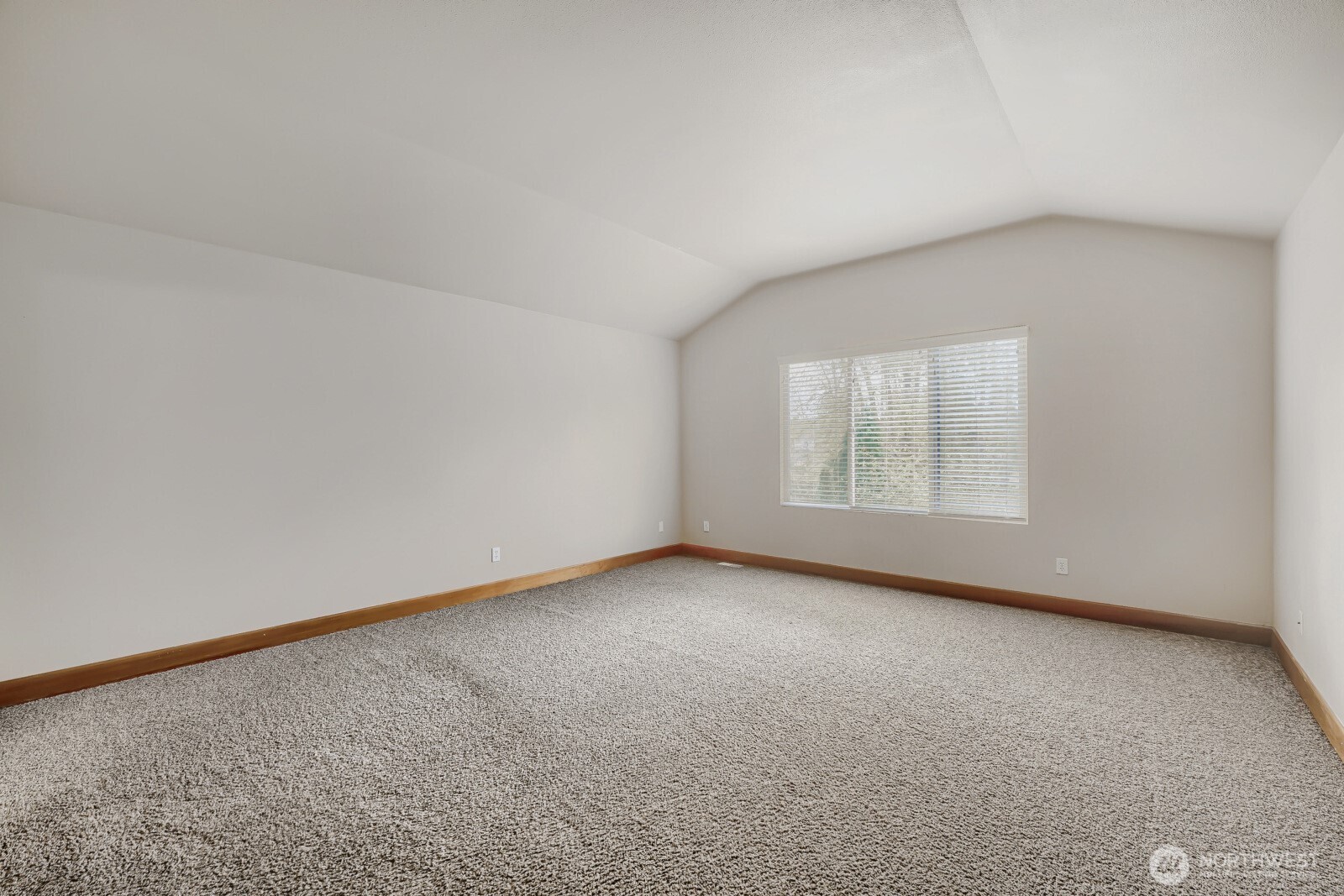 1104 Williams Street Northwest Orting, WA 98360 - Photo 12 of 27 an empty room with a empty space and windows