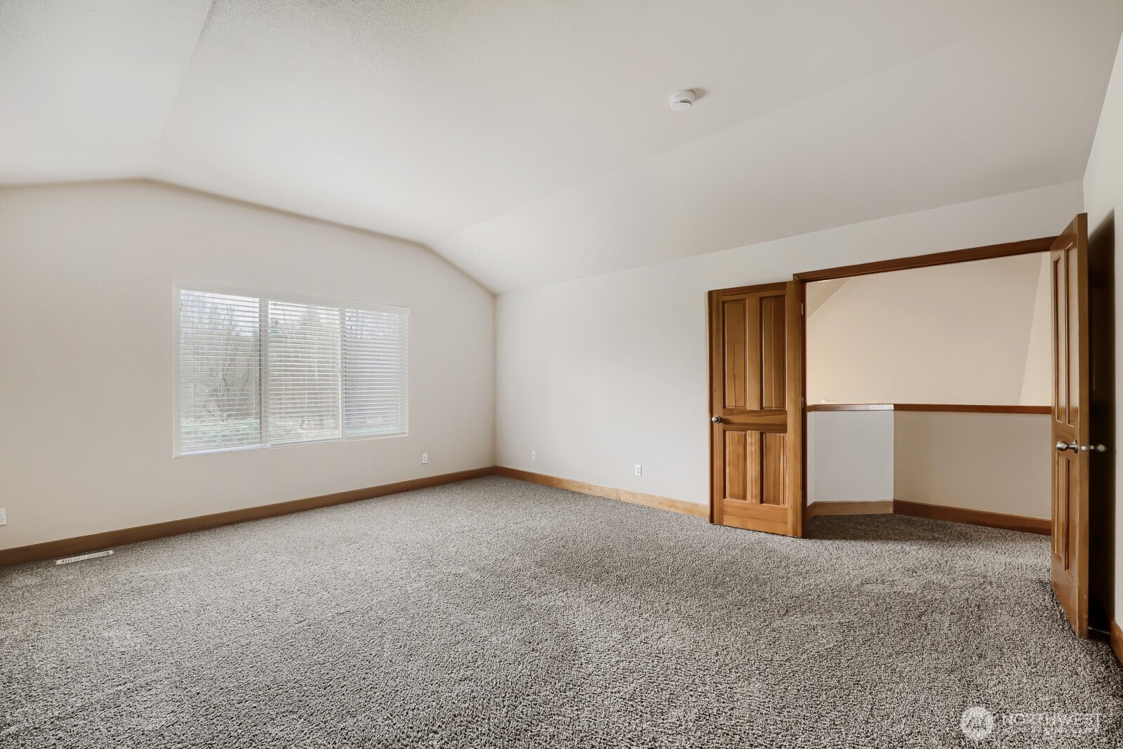1104 Williams Street Northwest Orting, WA 98360 - Photo 19 of 27 a view of an empty room with a window