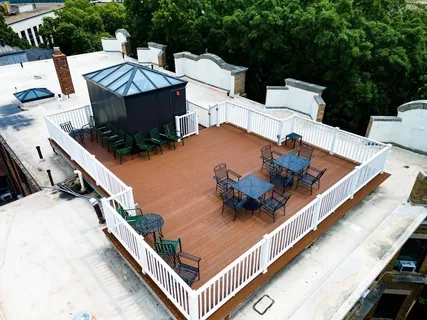 a view of a patio with chairs