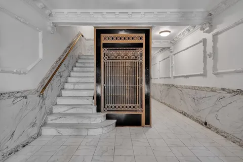 a view of an entryway with staircase