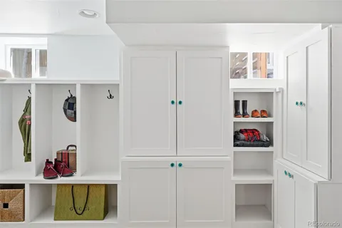 a view of backyard of house with seating space