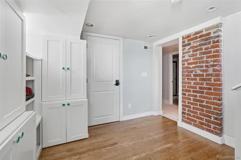 a patio with table and chairs