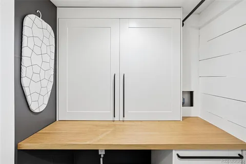 a view of a backyard with potted plants