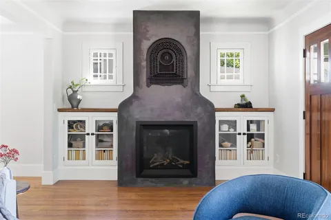 a kitchen with stainless steel appliances granite countertop a sink and a refrigerator