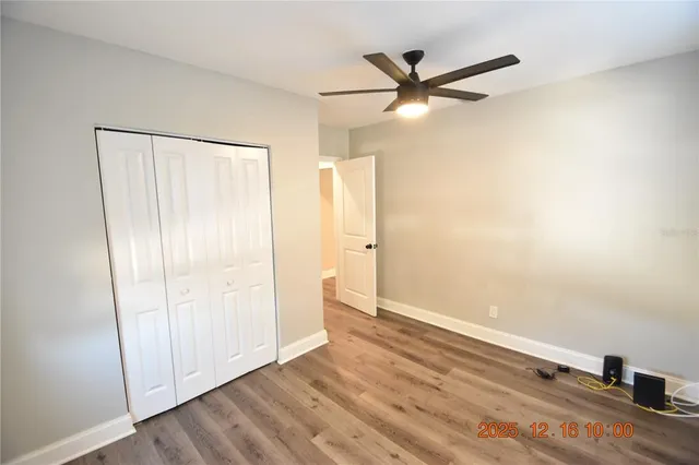 a view of a livingroom with wooden floor