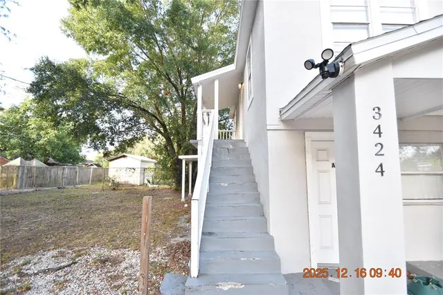 a view of a pathway of a house with a street