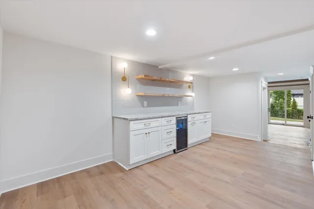 a view of a kitchen with a sink and a stove