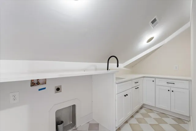 a close view of a closet in the kitchen