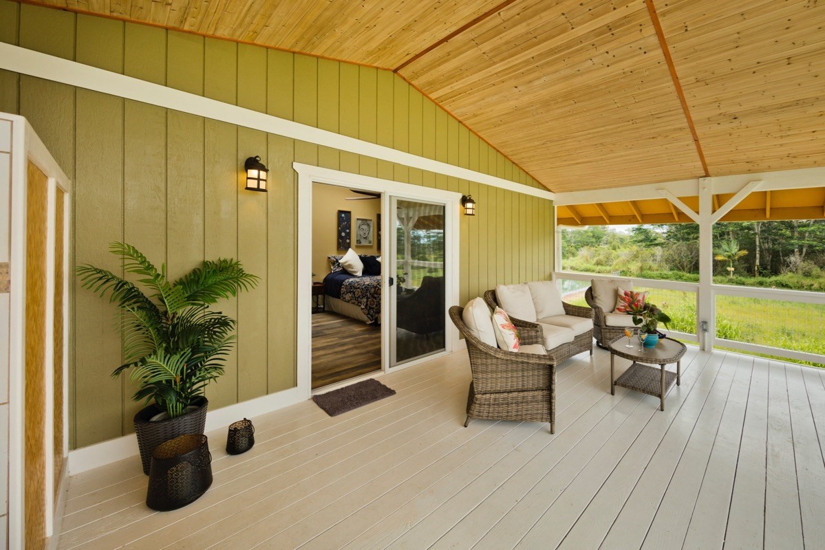 17-3926 Enos Road Mountain View, HI 96771 - Photo 16 of 30 a balcony with furniture and a potted plant