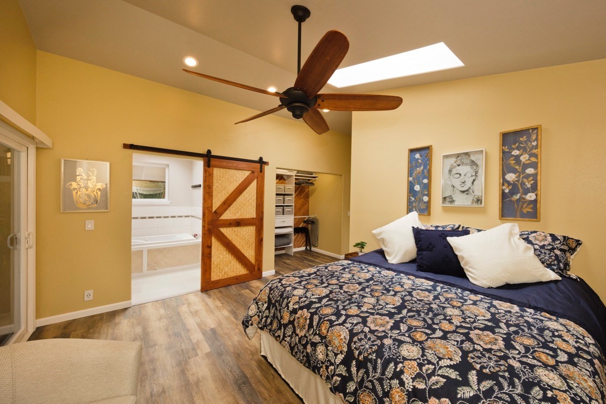 17-3926 Enos Road Mountain View, HI 96771 - Photo 25 of 30 a bedroom with a bed and a walk in closet