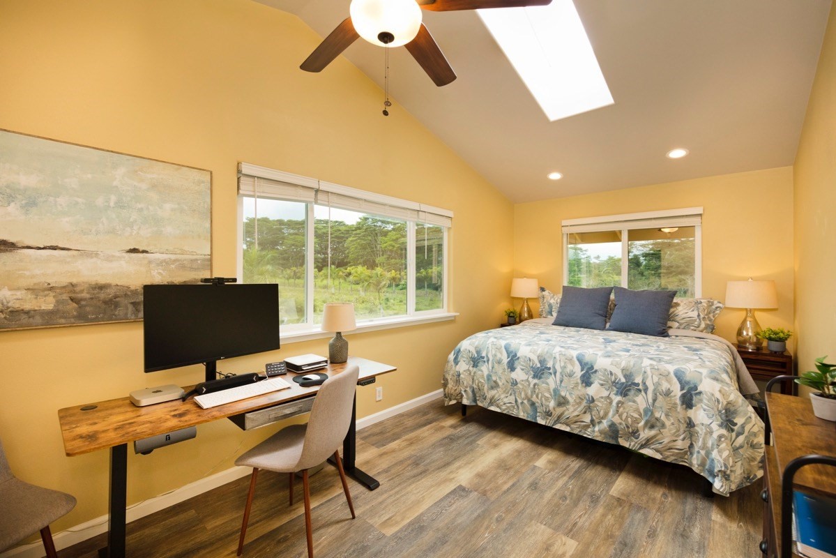 17-3926 Enos Road Mountain View, HI 96771 - Photo 28 of 30 a bedroom with a bed and large windows