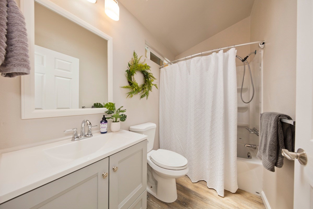 17-3926 Enos Road Mountain View, HI 96771 - Photo 30 of 30 a bathroom with a sink a toilet and shower