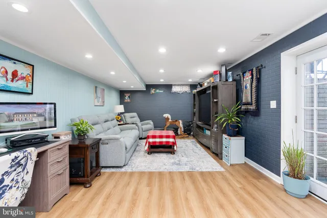 a front view of house with yard and outdoor seating