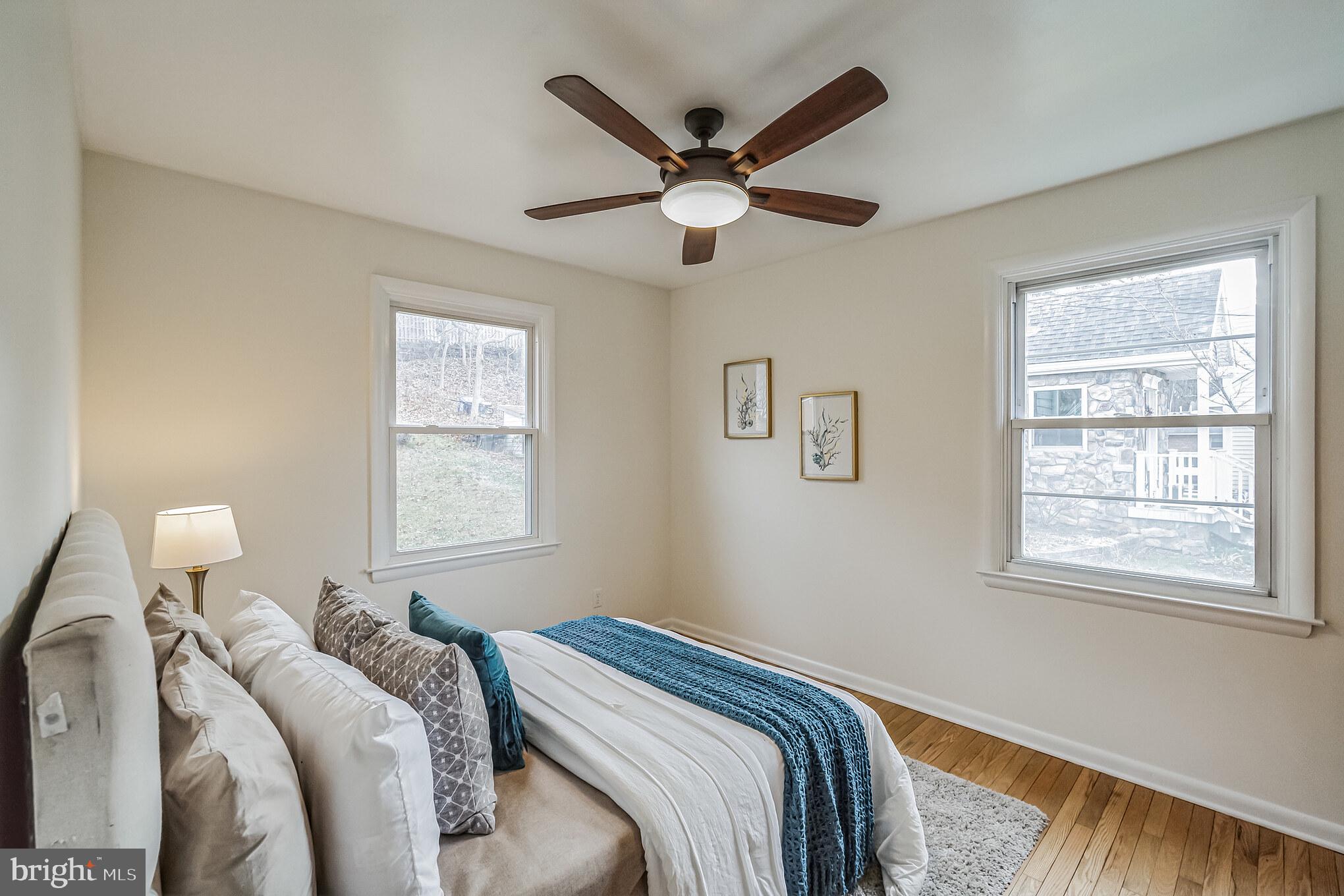 645 Glendale Road Havertown, PA 19083 - Photo 18 of 36 a bedroom with bed and a window
