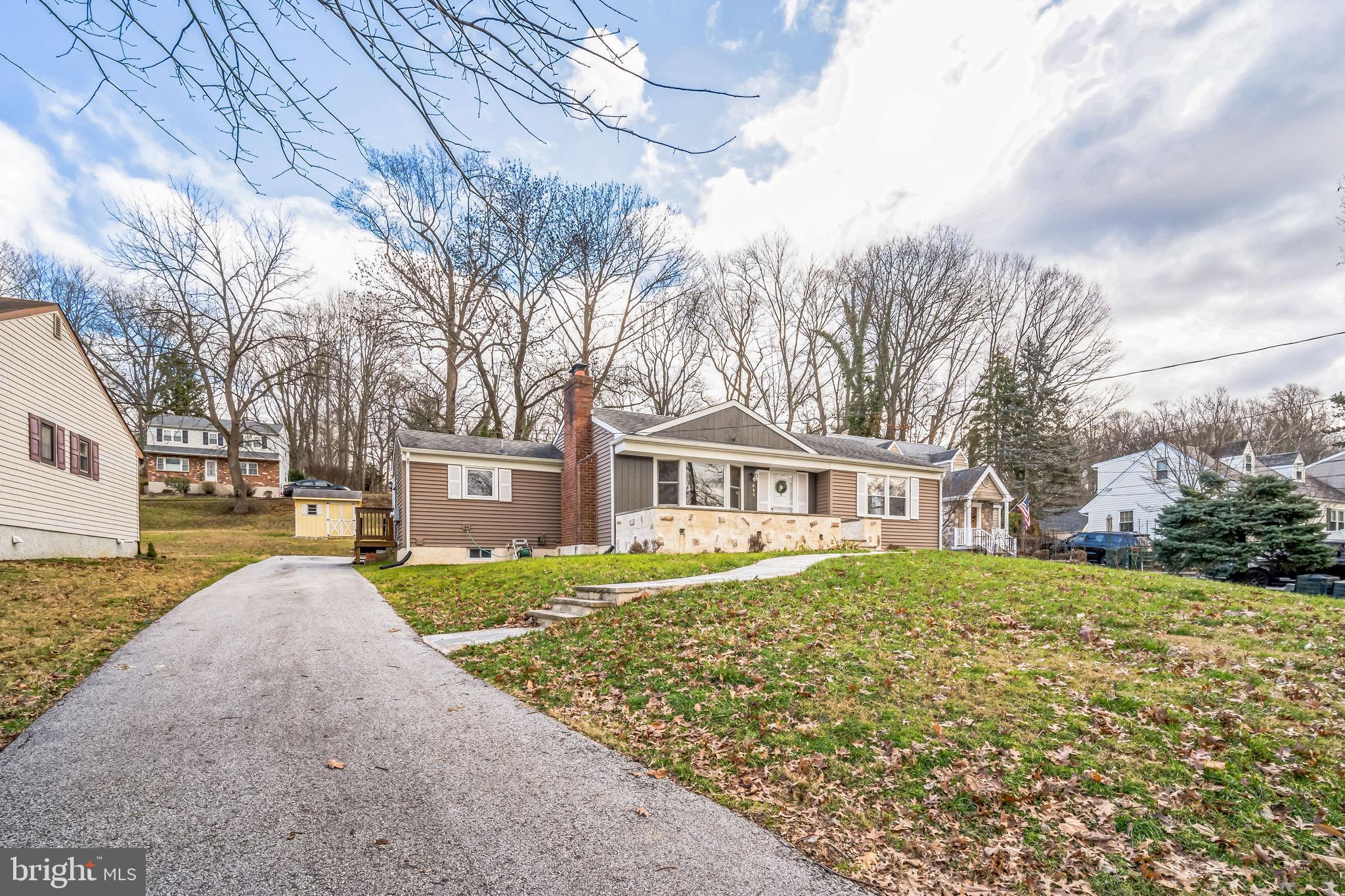 645 Glendale Road Havertown, PA 19083 - Photo 28 of 36 front view of a house with a yard