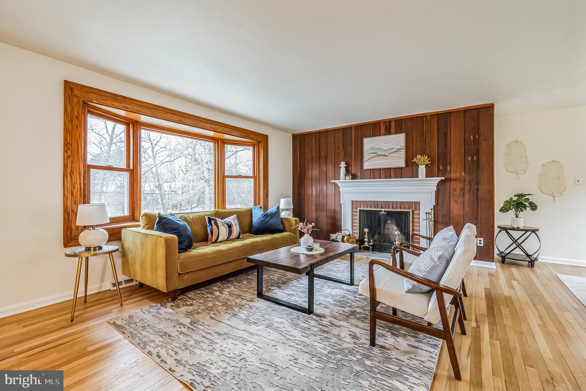 645 Glendale Road Havertown, PA 19083 - Photo 6 of 36 a living room with furniture and a fireplace