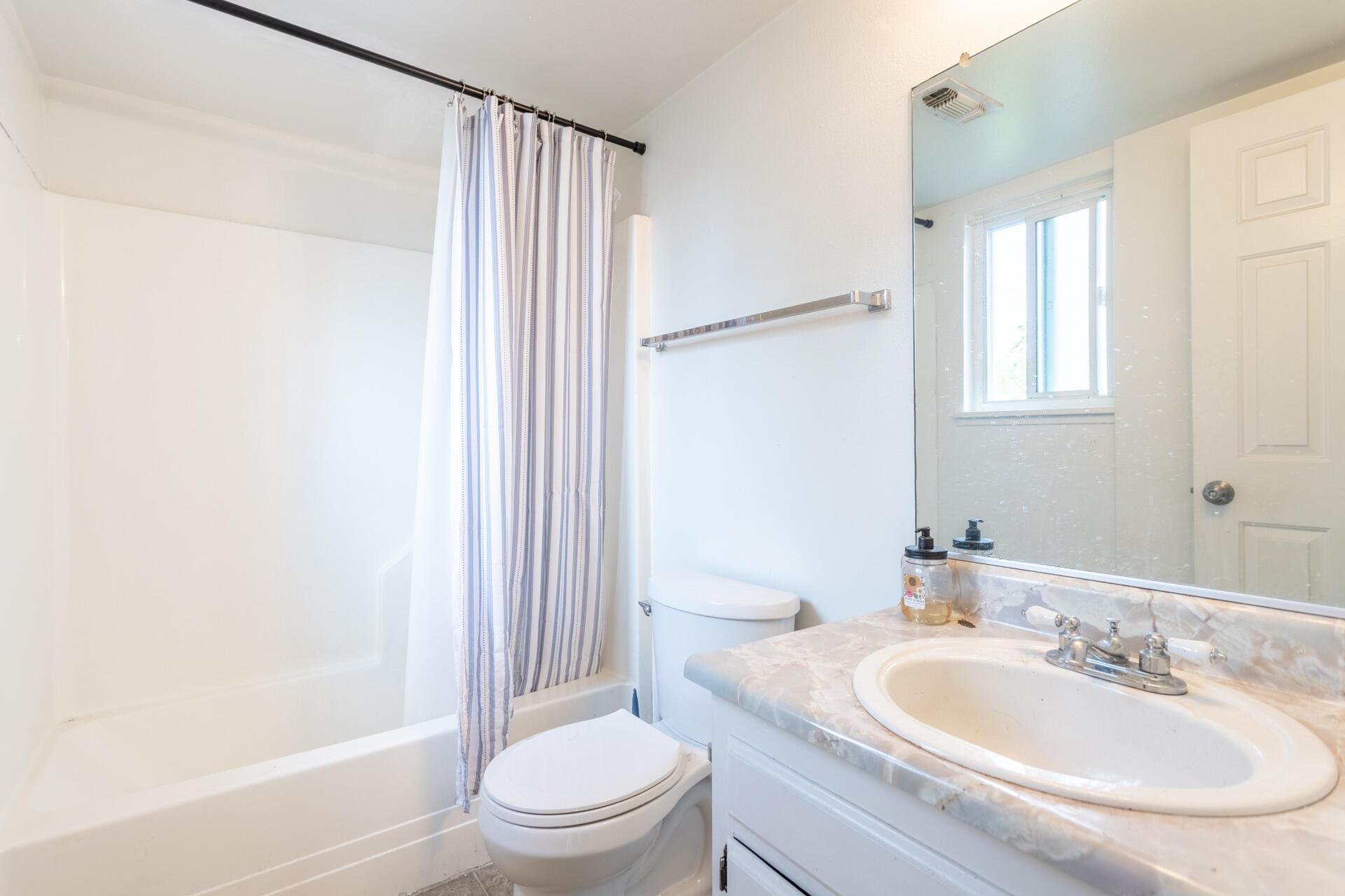 4720 Enchanted Way Redding, CA 96001 - Photo 13 of 19 a bathroom with a sink toilet and shower