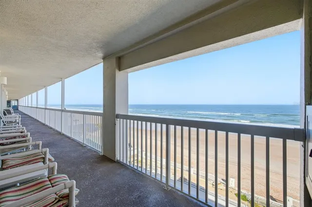 a view of staircase with wooden floor