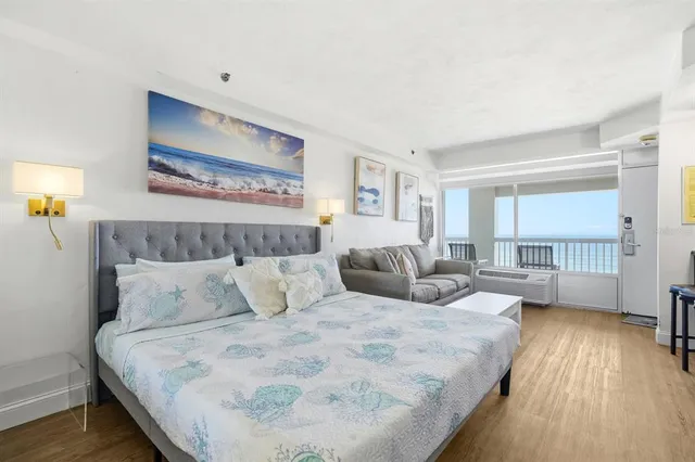 a bedroom with bed and window