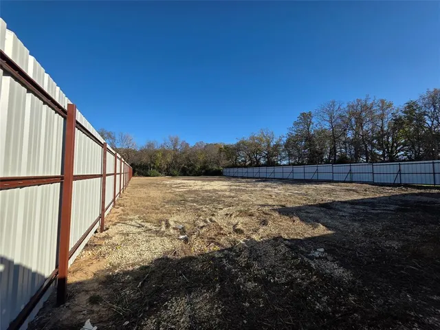 a view of swimming pool with outdoor space and seating area