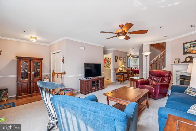 a kitchen with stainless steel appliances granite countertop a stove sink and cabinets