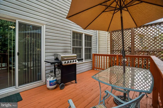 a bathroom with a bathtub a sink and a mirror