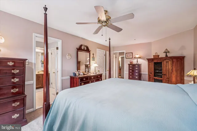 a room with furniture and a chandelier