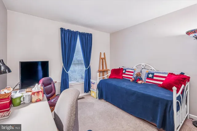a front view of a house with a door and wooden floor