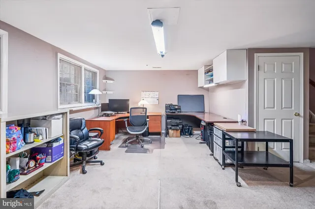 a view of a chairs and table in backyard