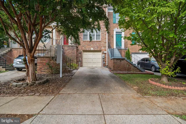a view of a balcony with a potted plant