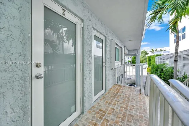 a balcony with a door