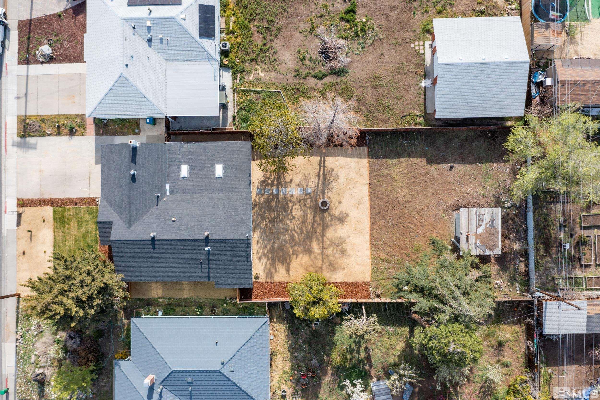 1220 Vassar Street Reno, NV 89502 - Photo 2 of 36 an aerial view of residential houses with outdoor space